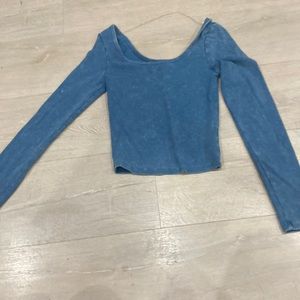 Blue long sleeve top.